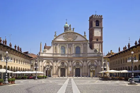 Piazza Ducale in Vigevano showing the concave facade of Sant'Ambrogio Cathedral.