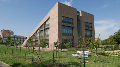 Modern building of the Mediateca in San Lazzaro di Savena with surrounding park.