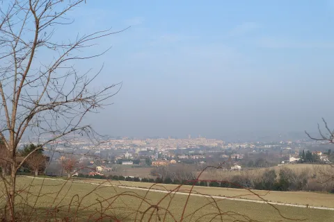 Distant panoramic view of the town of Jesi set against the rolling hills of Marche