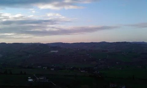 Panoramic view of the rolling hills near Osimo at twilight