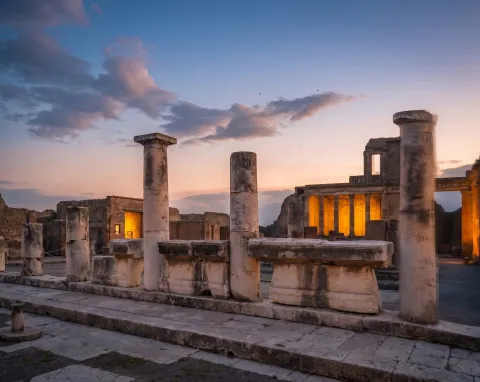 Ancient Roman columns and ruins at the Forum of Pompeii, Naples.