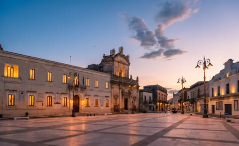 View of Piazza Garibaldi in Manduria with the Town Hall and San Francesco Church.