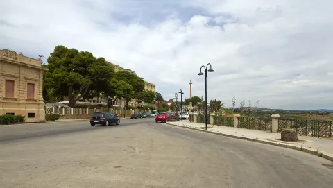 Panoramic street with cars, trees, and buildings in Sciacca, Agrigento
