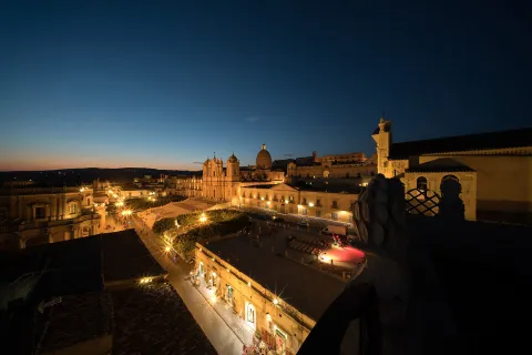 Night view of the historic town of Noto with its illuminated cathedral in Sicily.