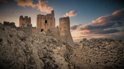 The medieval fortress ruins of Rocca Calascio perched on a rocky hill in Abruzzo.
