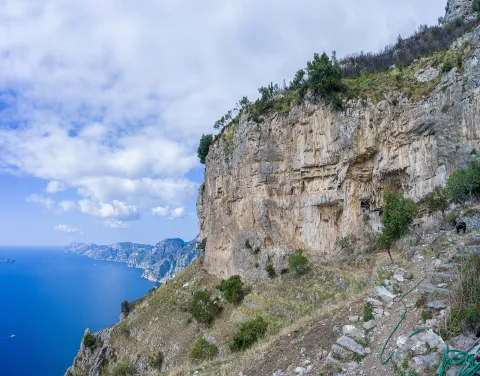 Rocky cliffs overlooking the sea along the Sentiero degli Dei in Agerola