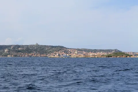 View from the sea of the coastline and town in the La Maddalena Archipelago