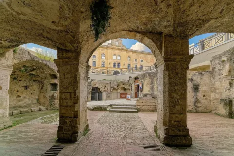 View through the arches of the Palombaro Lungo hypogeum in Matera.