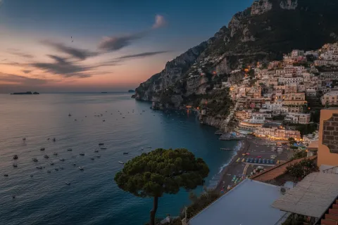 Panoramic view of Positano village and Spiaggia Grande beach on the Amalfi Coast.