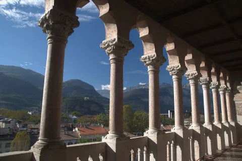 View of Trento and surrounding mountains from the columned loggia of Castello del Buonconsiglio.