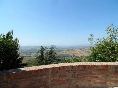 Panoramic view of rolling hills from Colle dell'Infinito in Recanati.