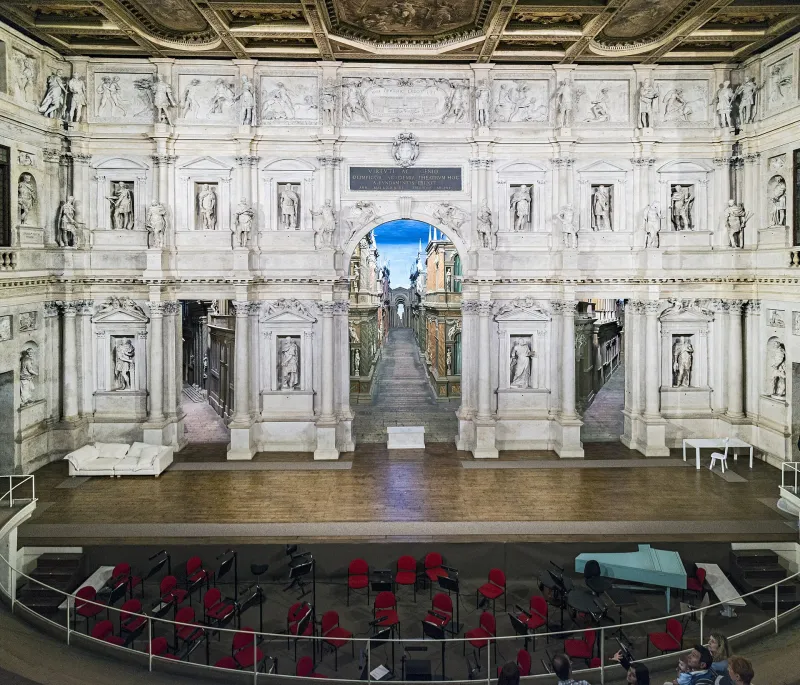 Stage and ornate classical proscenium facade of the Teatro Olimpico in Vicenza.